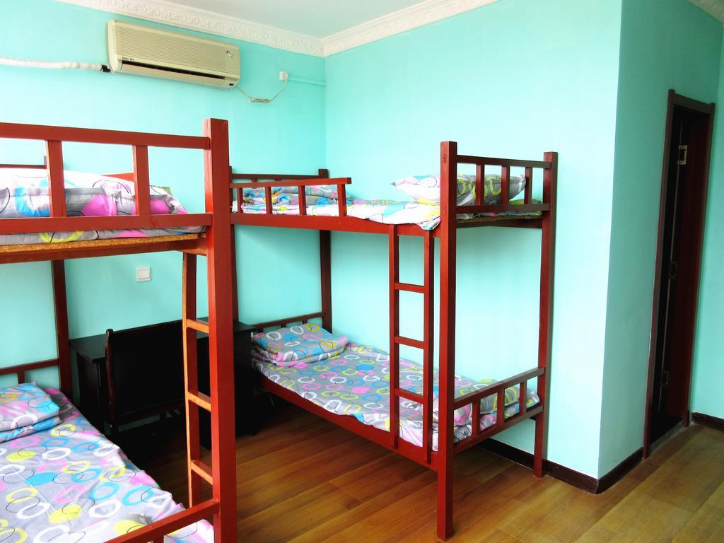 25°C Four Season Youth Hostel Qingdao Oda fotoğraf