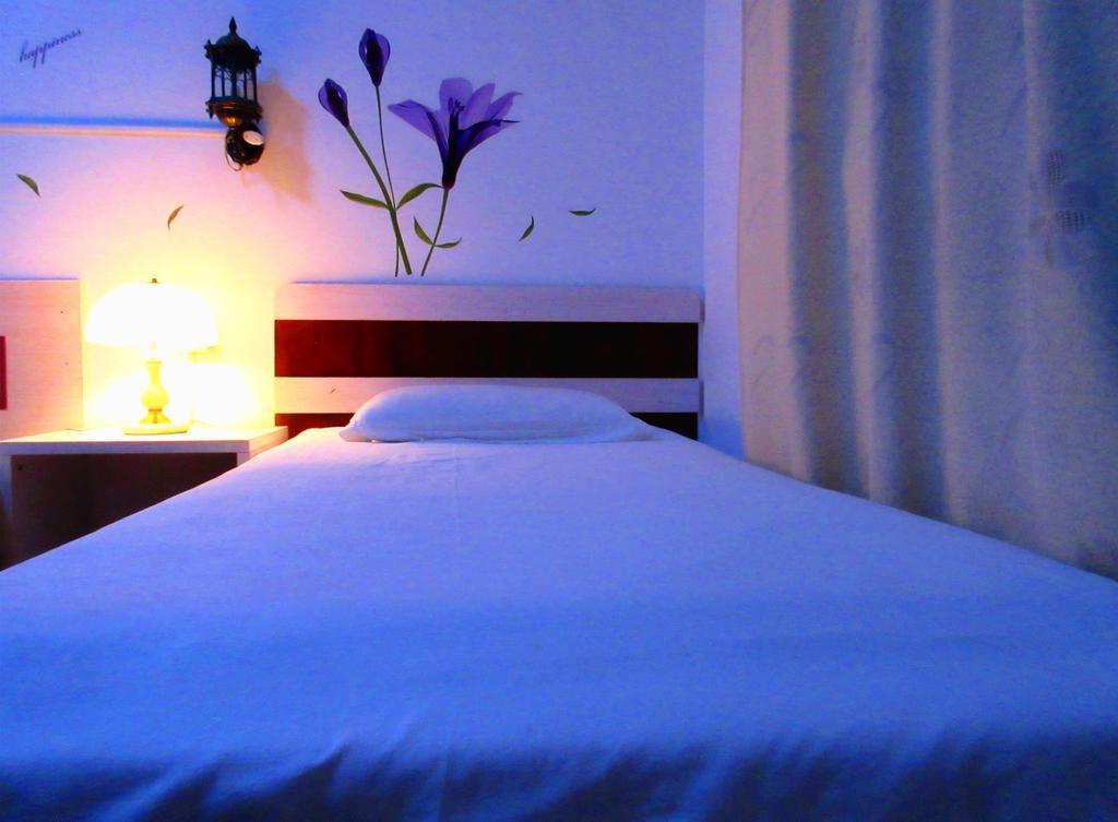 25°C Four Season Youth Hostel Qingdao Oda fotoğraf